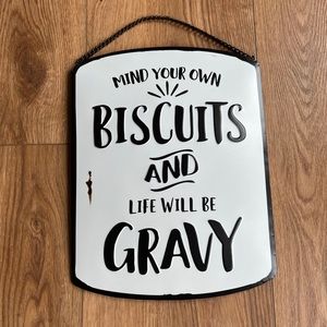 “Mind your biscuits” metal home decor sign